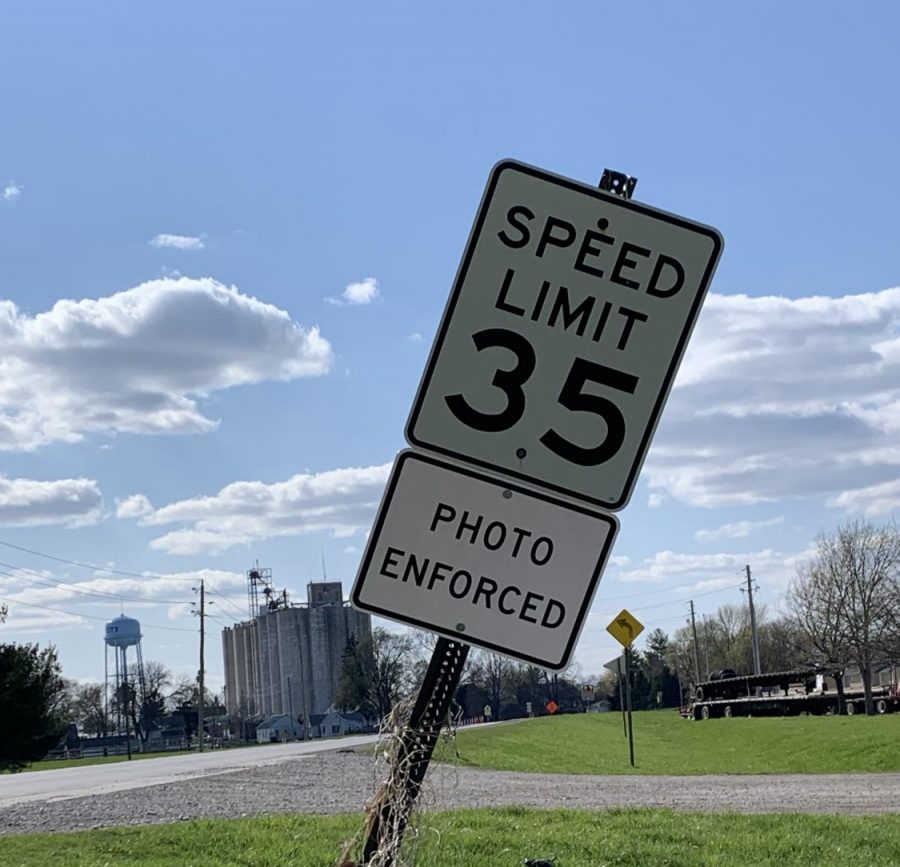Various+speed+limit+signs+in+town+have+had+new+photo+enforced+signs+placed+under+them+to+emphasize+the+new+speeding+regulations.