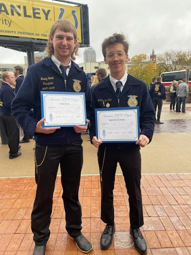 Brady North (Class of 2018) and Blake Van Der Kamp (Class of 2020) show their American Degree certificates in Indianapolis 