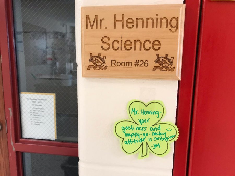 A shamrock in front of the science teacher, Matthew Henning. It is more personal than the majority of the shamrocks. 