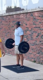 PCM coach Zack Woods lifts before the PCM at Divis County game on Aug. 26. 