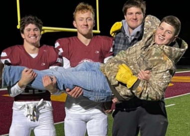 Easton VanVeen (middle) with some of his friends on football senior night. Photo creds to Easton VanVeen.