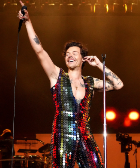 Harry Styles Covers 'Hopelessly Devoted to You,' Dresses as Danny Zuko