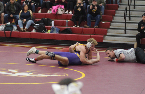  Vanderpool pins Nevada opponent in third period.
Photo credits: Trinity VanRyswyk.