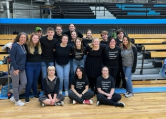 Coaches Janice Davis and Brooke Grett pictured with all of the students present at the district competition. Photo taken by Nikolas Ball.
