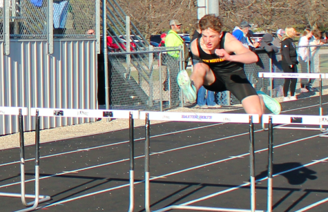 Junior Griffin Olson competes in the 4x100m hurdles. 