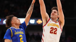 ISU forward Milan Momcilovic shoots over an SDSU player in the round of 64 in the NCAA Tournament 