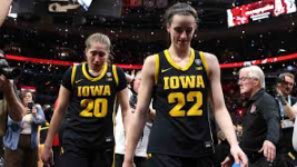 Caitlin Clark and Kate Martin walk off the court for the last time as Hawkeyes