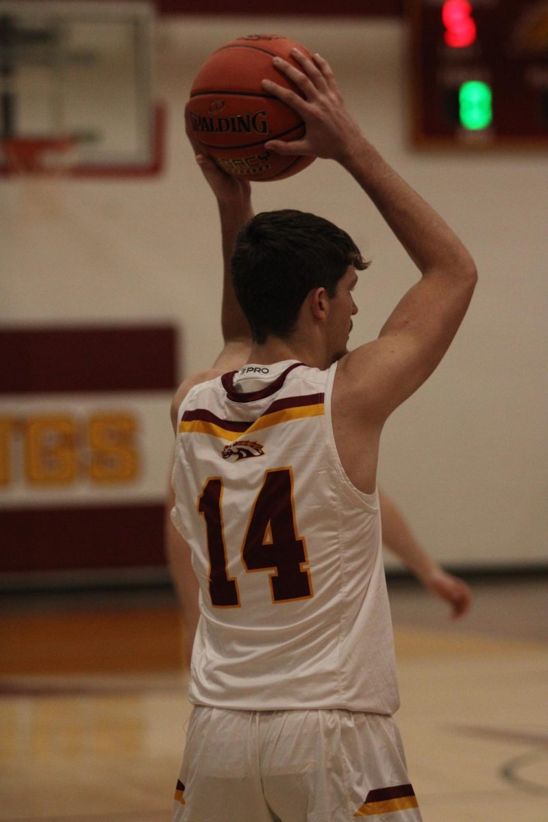 Junior Chase Wagaman passing the ball