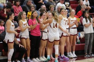 Senior, Addison Steenhoek, celebrates with teammates as they secure the victory.