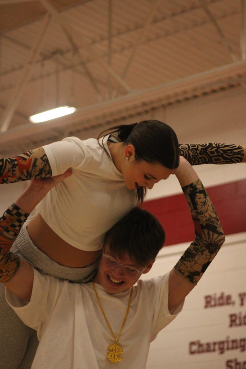 Juniors Seriah Nolin and Charlie Ford preforming co-ed at the annual Winter dance show