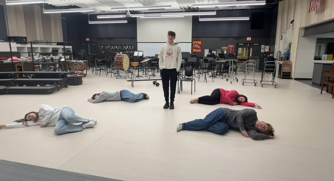 Musical theatre members Piper Clark, Emilyn Davis, Carter Dudley, Cade Burtkett, and Rylan Edgington practice their performance of “Fall Fair” from the musical Ride the Cyclone. 

