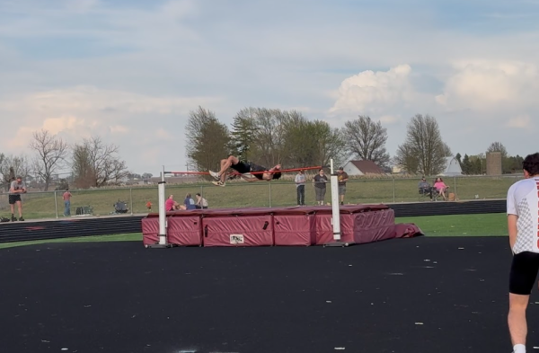 Junior, Kolby Clark, attempting a high jump of 5’6” at the Pella Christian Coed Invite on April 16. 
